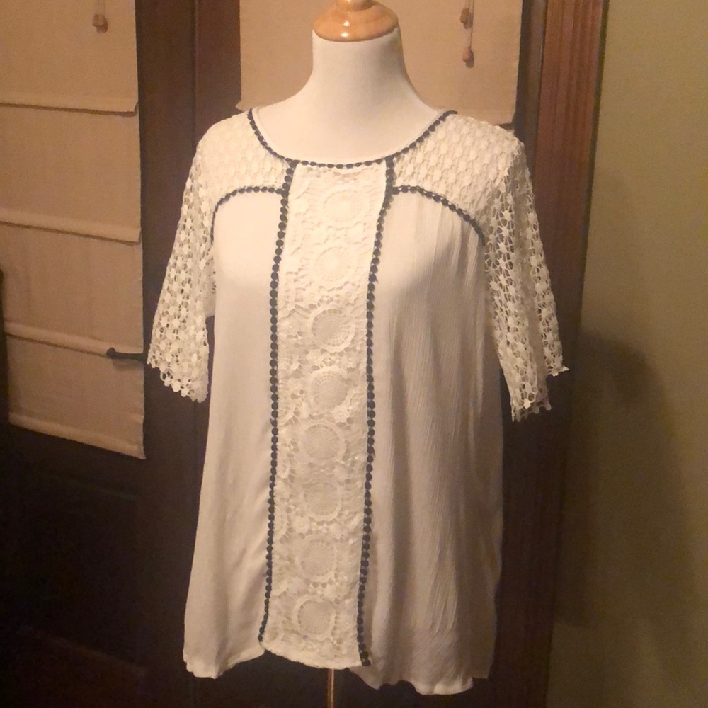 Blouse with lace inlay & black scalloped detail.